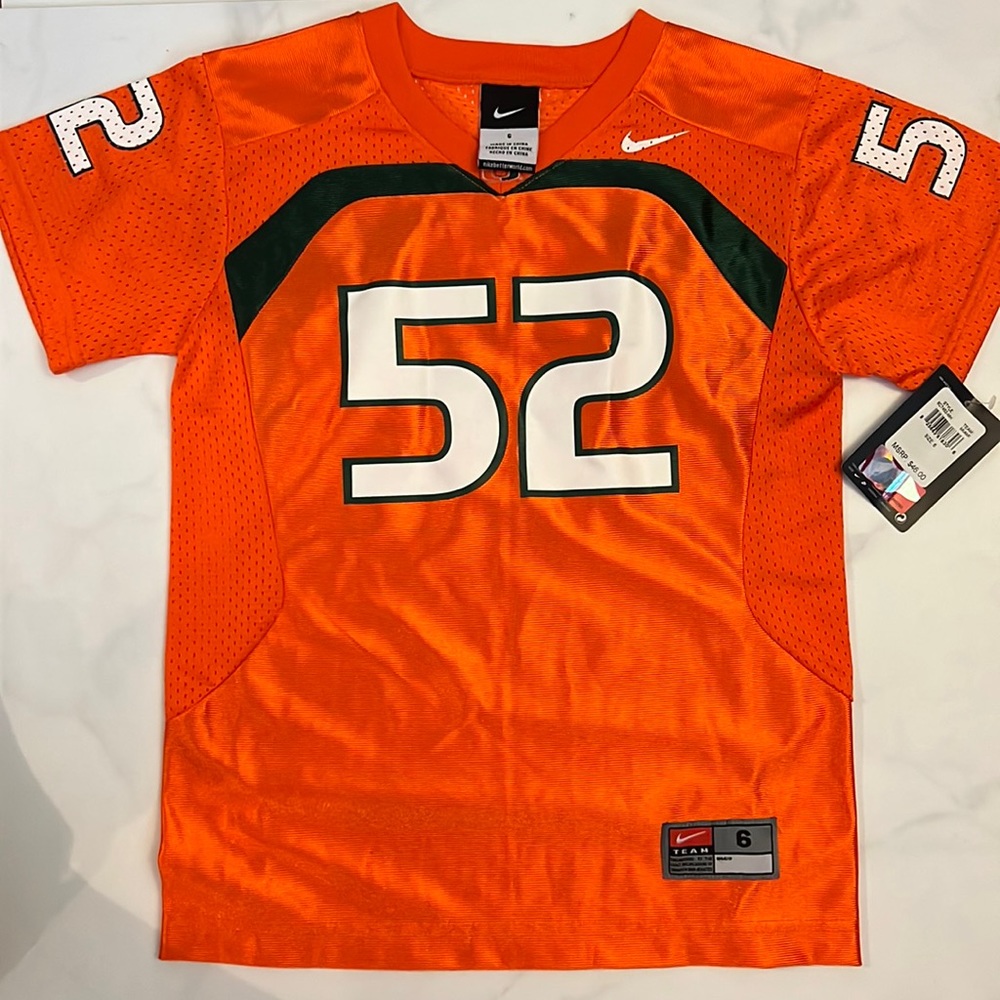 UM kids jersey number 52 size 6 new with tags